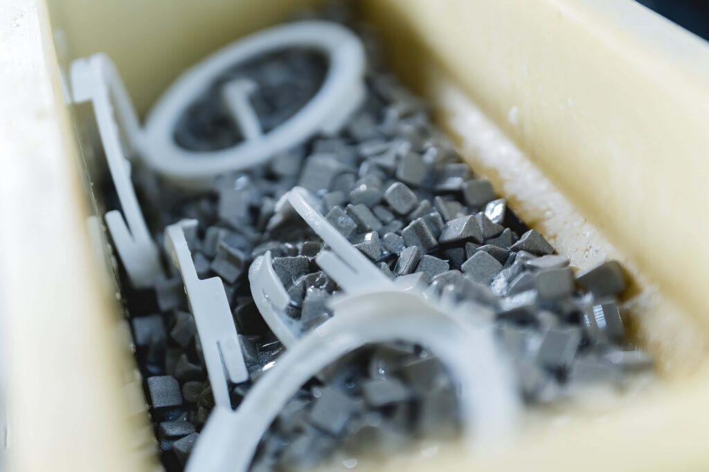 3D-printed components are finished in a tumbling finishing machine.